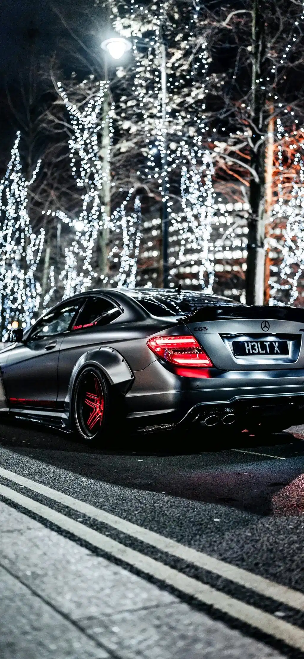 Silver Supercar Rainy Night Street